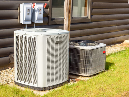 An AC and heat pump outside a Dallas, OR home
