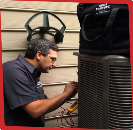 Home Comfort Technician Servicing HVAC unit